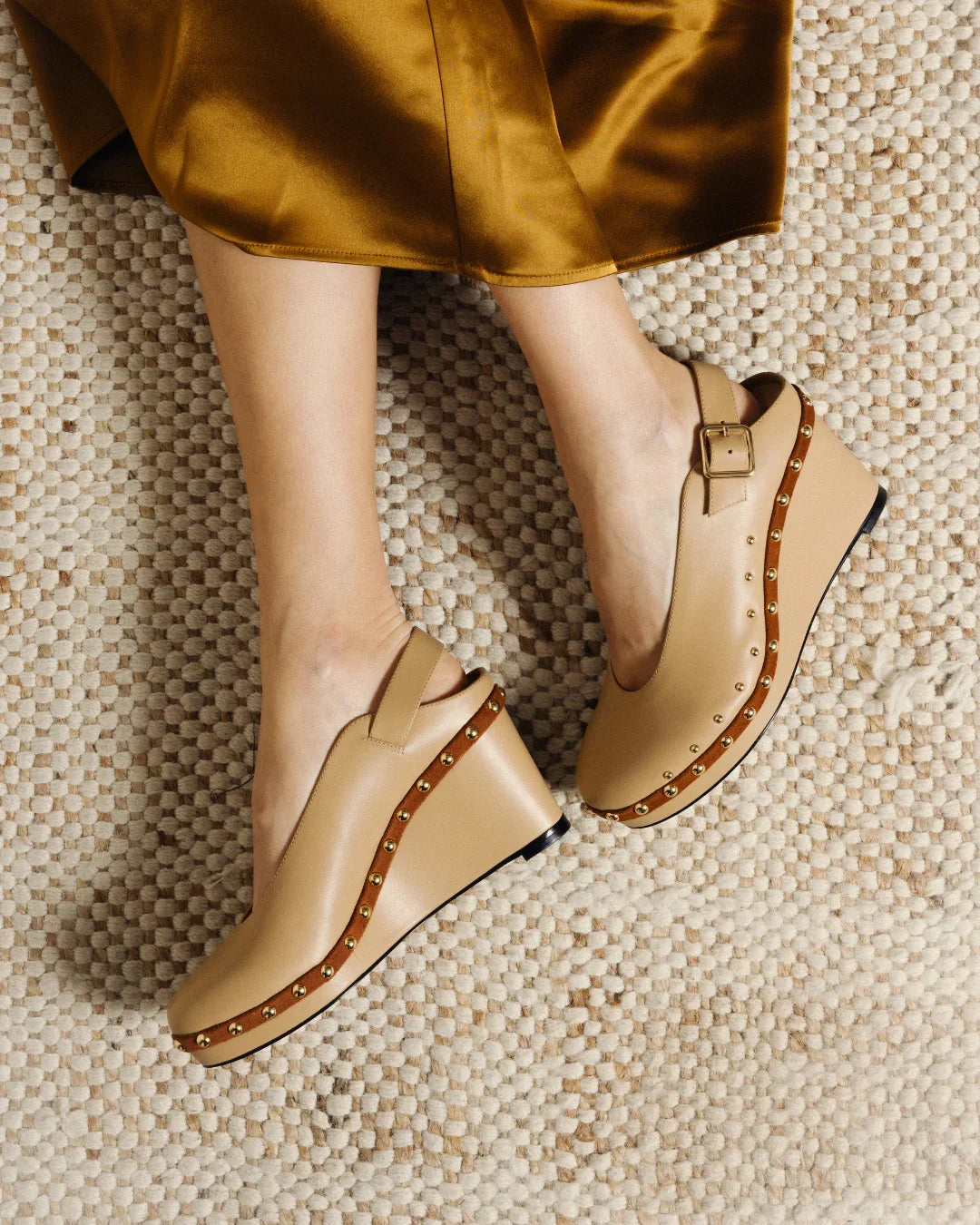 Beige wedge sandals with studded platform and ankle strap, stylish for everyday wear