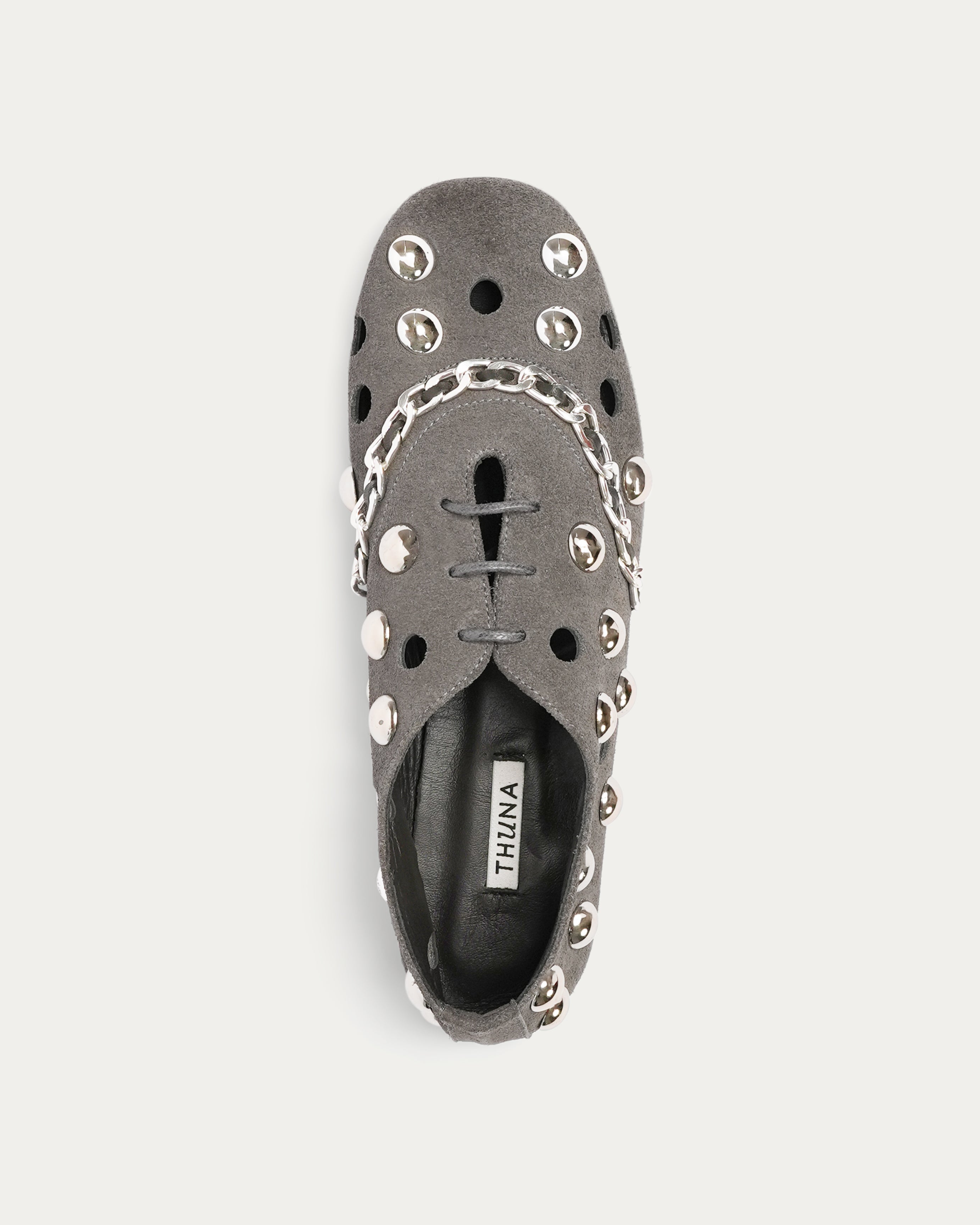 Gray flat shoe with studded details on a white background n- THUNA Kuwait - Saudi 