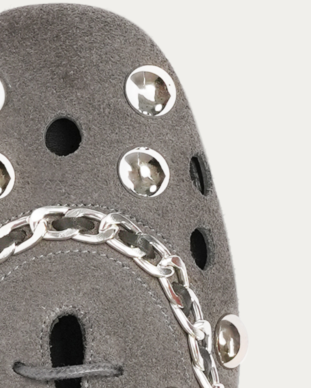 Gray flat shoe with studded details on a white background n- THUNA Kuwait - Saudi 