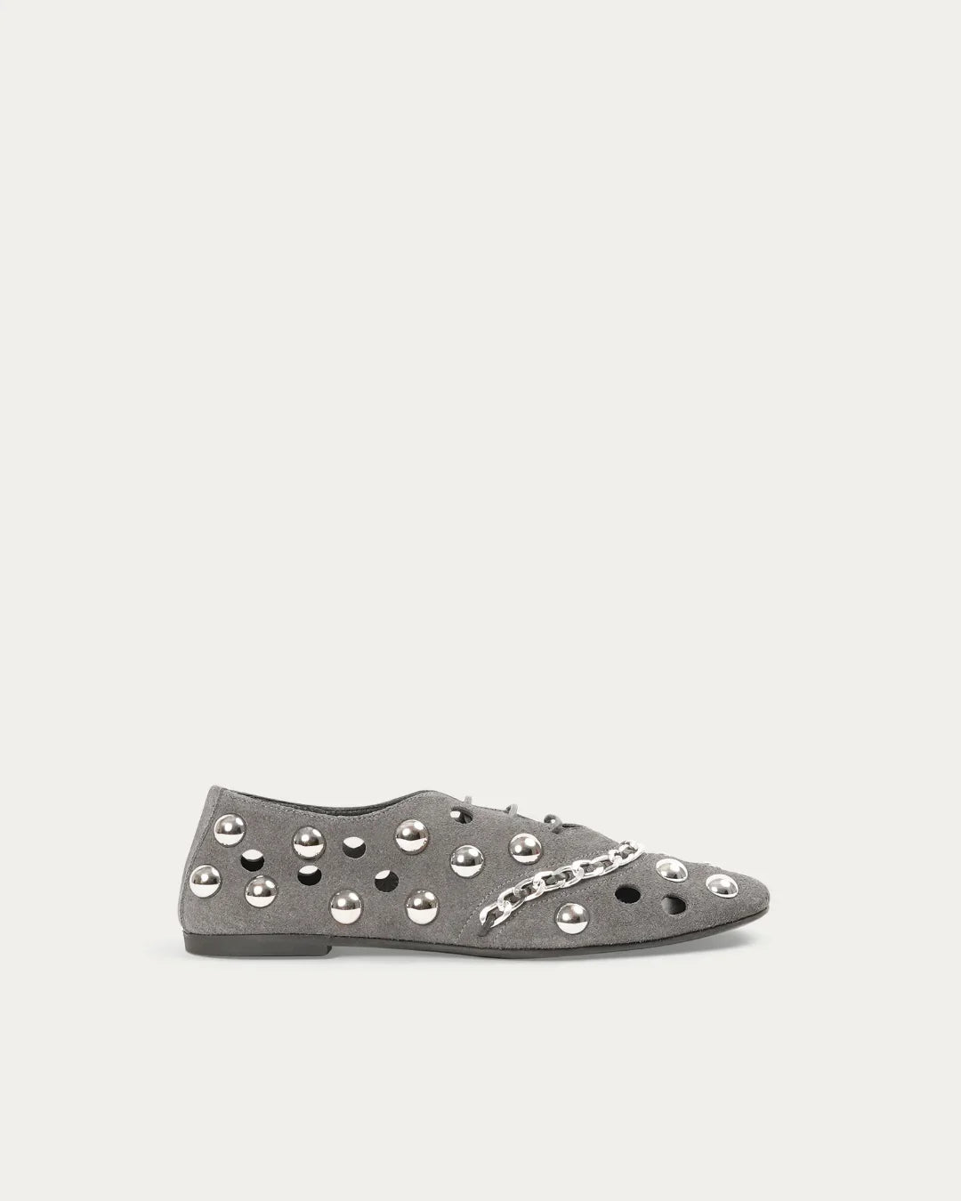 Gray flat shoe with studded details on a white background n- THUNA Kuwait - Saudi 
