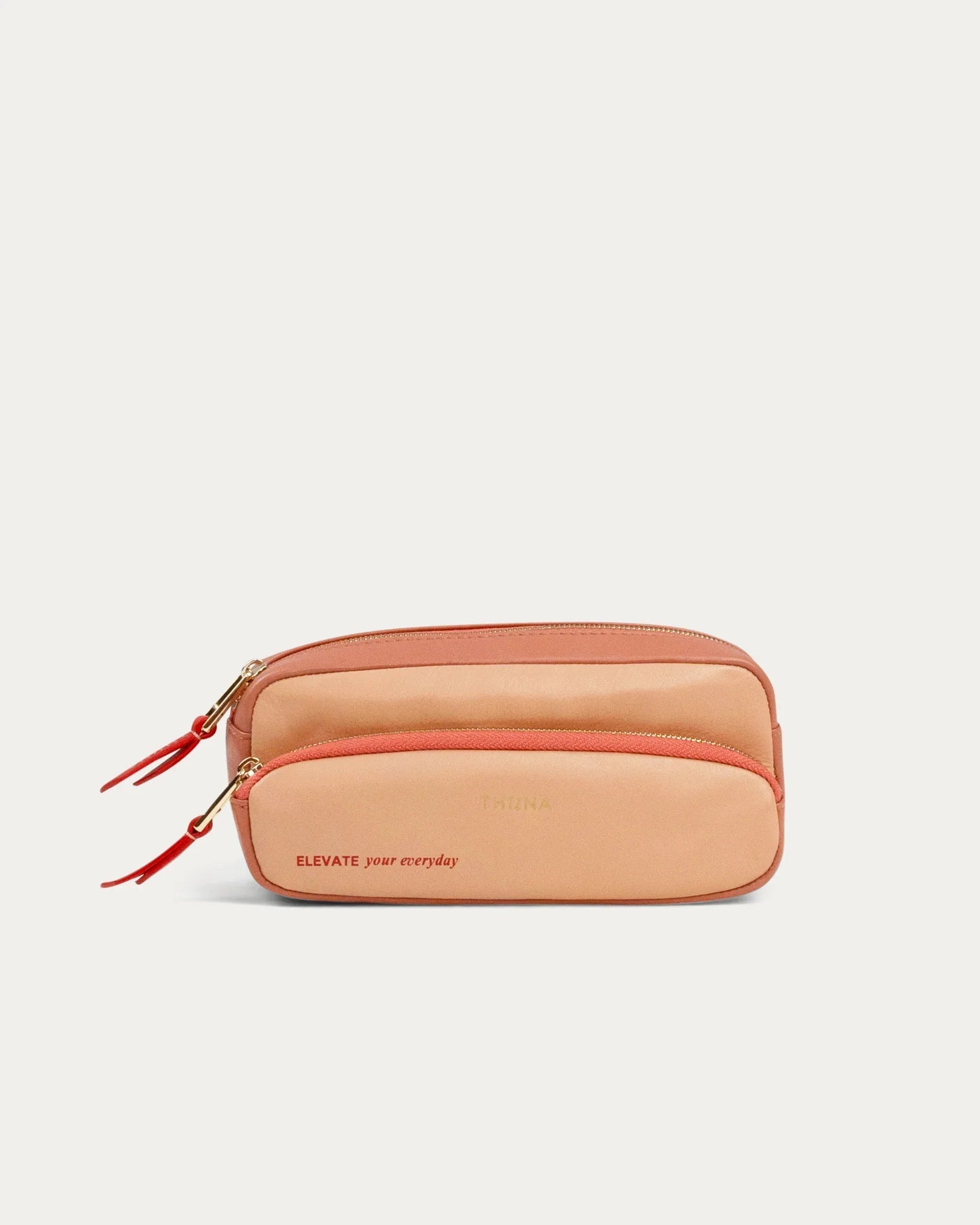 Beige and red rectangular pouch with 'Elevate your everyday' text on a light gray background - Kuwait bags - KSA Bags 