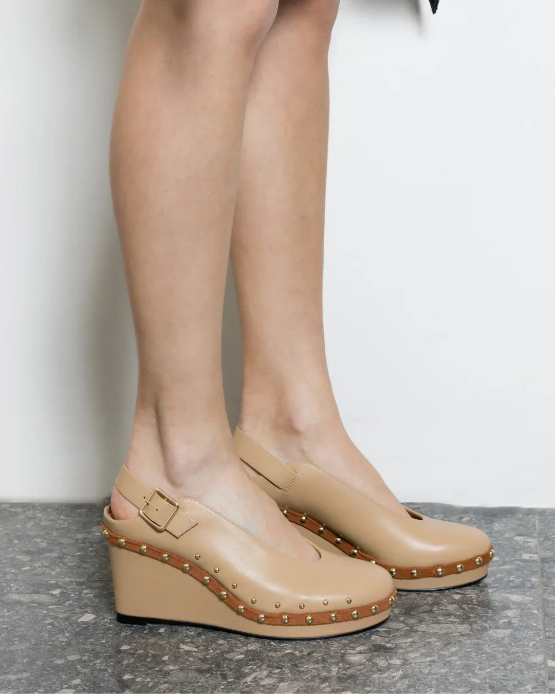 Beige wedge sandals with studded platform and ankle strap, stylish for everyday wear